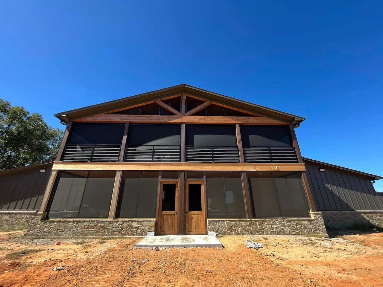 Exterior motorized shades for enhanced privacy and sun control.